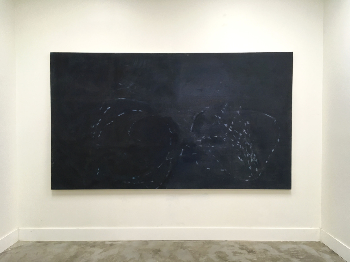 Bruise - An Oil Painting by Brian Dario, A dominantly black painting hanging on a white wall, various shades of black throughout, there are circling patterns of staccato faintly painted amorphous white paths take up the bottom two-thirds of the painting